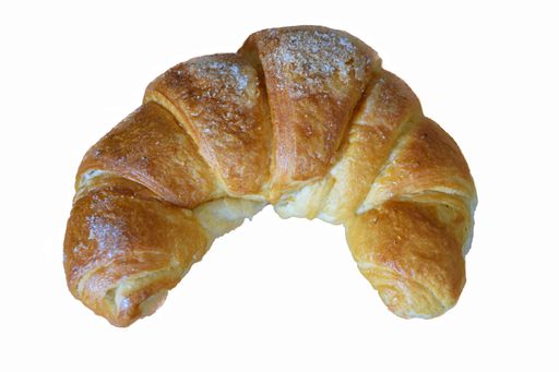 A closeup of a croissant with sugar powder under the lights isolated on a white background