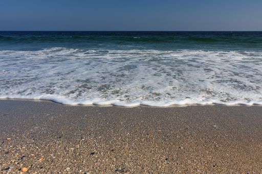 A beautiful view of a sandy beach on a sunny day