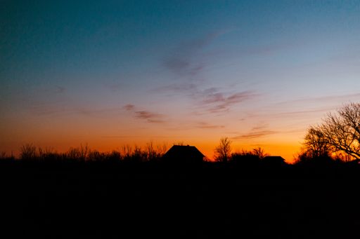 A beautiful view of the landscape gleaming under the shiny sunset