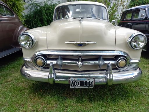 shot of an old American Chevrolet Chevy Bel Air four door sedan 1953 by GM. Front view. CADEAA 2021 classic car show.