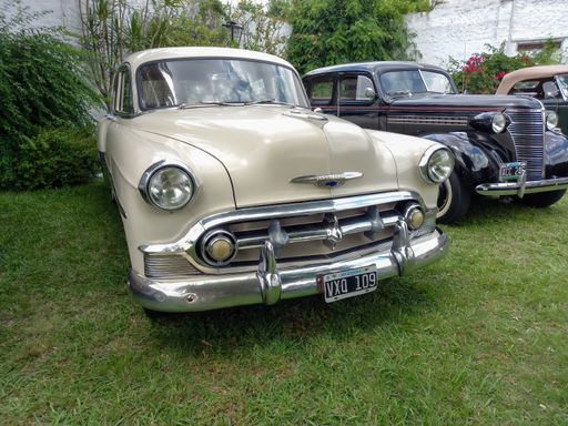 shot of an old American Chevrolet Chevy Bel Air four door sedan 1953 by GM. Front view. CADEAA 2021 classic car show.