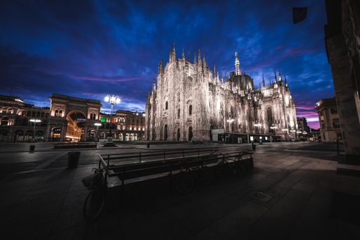 An amazing shot of the Duomo di Milano's amazing architecture on a night sky background