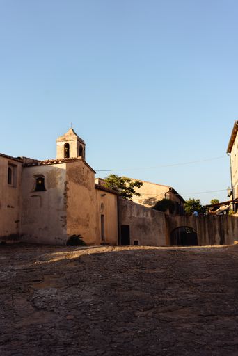A vertical shot of an old middle eastern village with white buildings