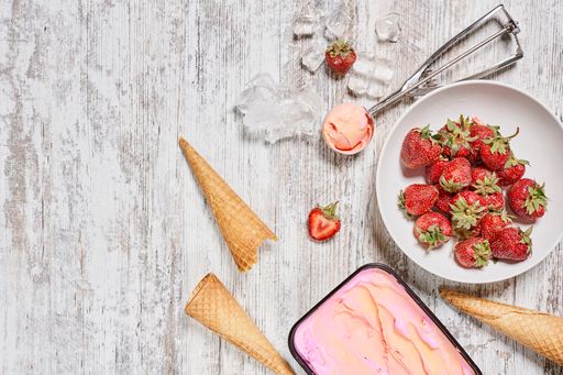A top view of strawberry ice cream with waffles cones