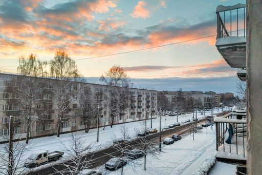 The blue sky over the old Soviet buildings. of Purvciems, Riga, Latvia in winter