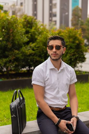 A closeup of a young enterprising man, striving for his business