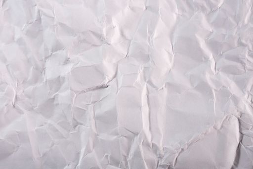 A closeup shot of a white crumpled paper