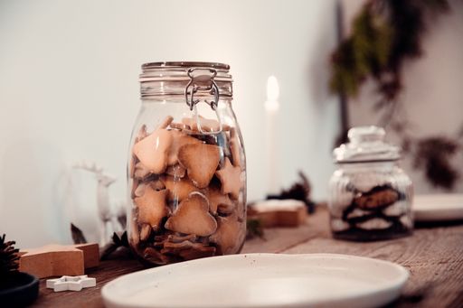 A closeup of a jar with cookies
