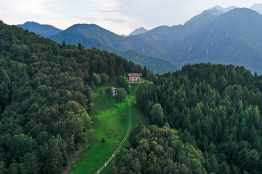 house in the mountains, drone shot, aerial, shot on Mavic 2 Pro, near lake Ledro, near lake Garda, Trentino, Italy