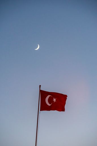 A beautiful evening view of the Turkish flag in republic square in Kayseri