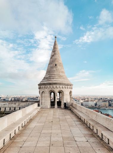 Turret on walls of Fisherman's bastion overlooking river Danube and city of Budapest, Hungary. Fisherman's bastion or Halaszbastya is loca