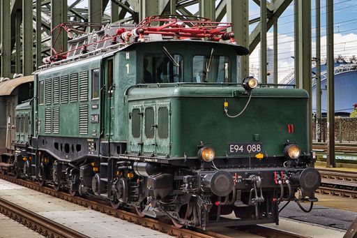 The historic railroad engine on the Hohenzollern Bridge in Cologne, Germany