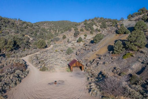 An aerial photo of an abandoned wooden structure at the mining camp ghost town of Pine Grove.