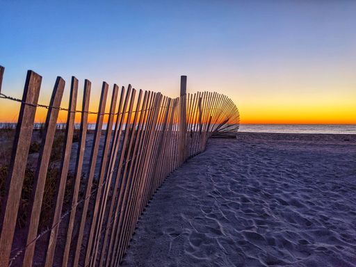 A beautiful shot of a sunset sky over the Pawleys Island Pier in South Carolina