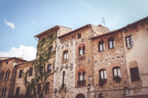 Typical stone building in the city center of San Gimignano, Italy