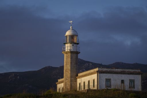 A beautiful shot of the Larino Lighthouse on a hill In Galicia Spain