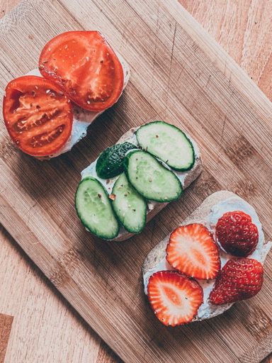 A top view of a vegan sandwich on a wooden board
