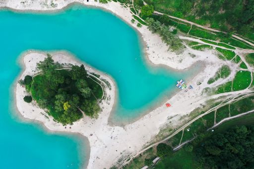 Topdown drone shot of lake Tenno in Italy,Trento,near lake Garda,shot on Mavic 2 Pro