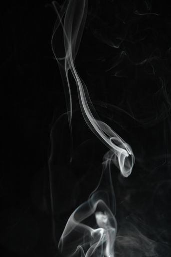 Real colorful smoke on black background.