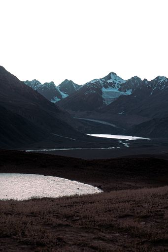 A vertical shot of Chandra Tal Lake, Himalaya, Spiti Valley in a gloomy day