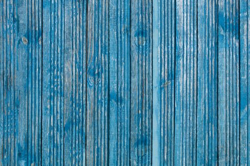 A shabby blue paint on old wooden boards and wood texture