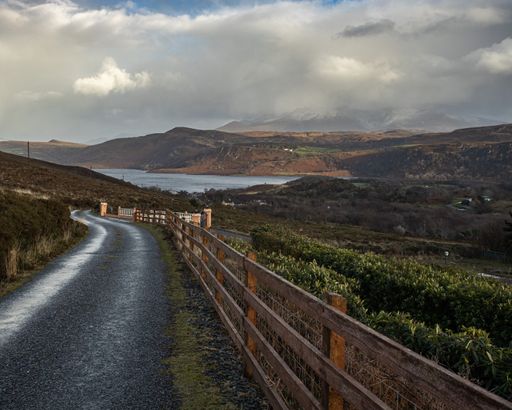 The view of the empty road. Ring of Kerry, one of the Irish Loughs.