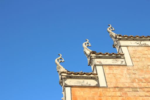 A low angle shot of an old and historic building on a sunny day