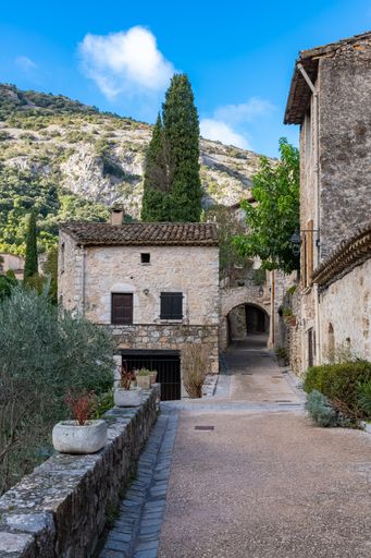 Saint-Guilhem-le-Desert in France, view of the village, typical street and houses