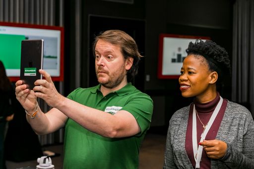 The Vendors demonstrating a product service at retail industry conference Johannesburg, South Africa