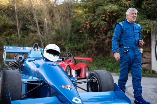 A Formula Renault in the Rally hill climb in Sant Feliu Codines and the driver standing next
