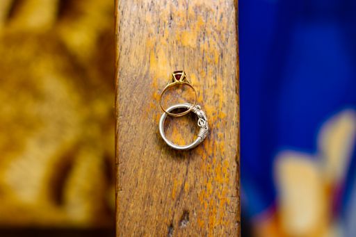 A selective focus shot of rings on a wooden chair from Madagascar