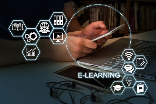 a slide of marketing presentation related E-learning education with a human holding tablet.