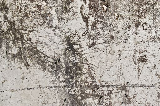 A closeup shot of a concrete wall texture with cracks