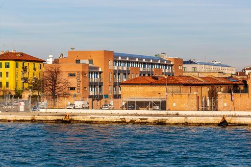 Venice, Italy - December 15 2021: View from Giudecca Channel of the residence for sudents Camp1us