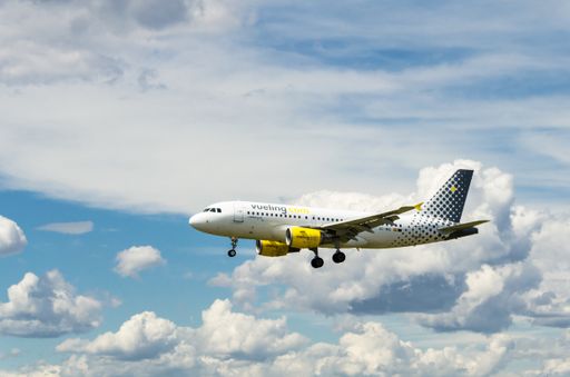 A view of Airbus A319 airplane of the Vueling company, landing at the Josep Tarradellas Airport in Barcelona-El Prat, Spain