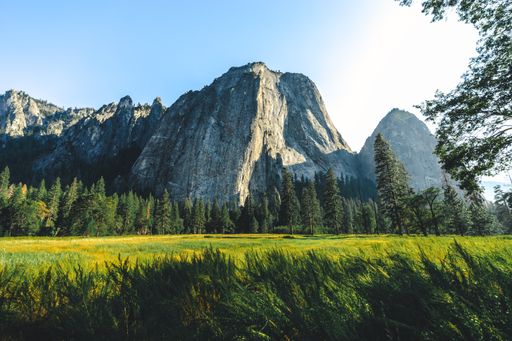 A stunning view of high rough rock mountains in Yosemite National Park, California, US at sunrise