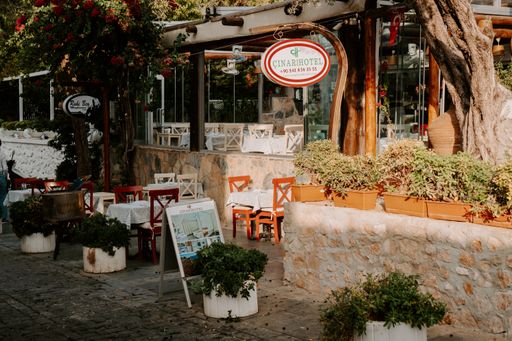 Cozy little restaurant on the streets of Turkey. Wooden cozy cafe, cobblestone street