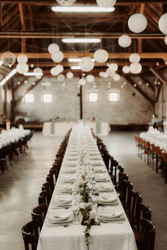 A vertical shot of a decorated hall with round light bulbs