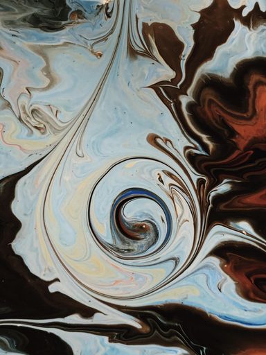 A vertical shot of a patterned surface of blue red black white colors - perfect for background