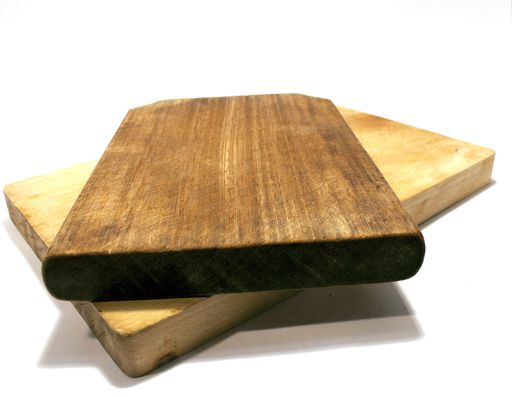 The two wooden chopping boards isolated on the white background