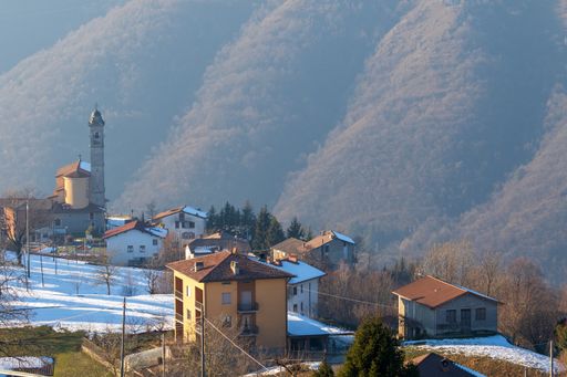 Somendenna, Zogno, Bergamo, Lombardy, Italy: Landscape view with Church of San Giacomo Maggiore and Santa Maria Assunta