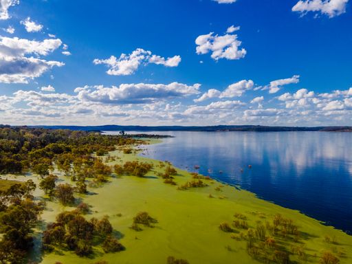 Aerial View at Copeton Dam Waters with the small lake and beautiful blue sky in Australia
