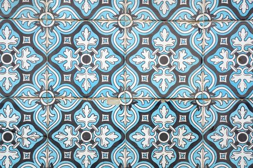 A closeup of a wall with typical Portuguese azulejo tiles