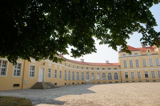 A large square in front of the historical palace.