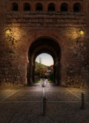 A vertical shot of an old building's arch