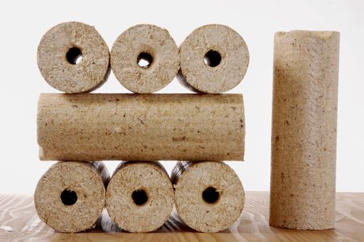 The round wooden briquettes isolated on a white background