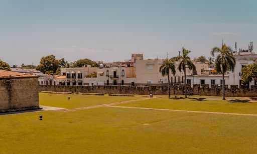 A panoramic view of colonial houses and the walls of Ozama Fortress, Santo Domingo, Dominican Republic