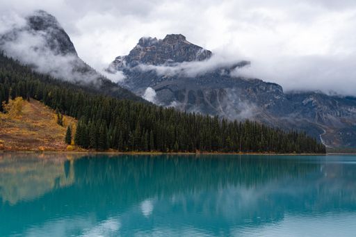 A landscape of the Emerald Lake surrounded by hills in Yoho National Park in Canada