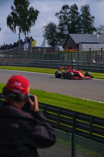A male taking photos during the International Auto racing Formula 1 at Circuit de Spa-Francorchamps  in Stavelot, Belgium