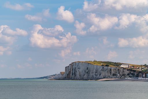 The cloudy blue sky over the English Channel, France on a sunny day in summer